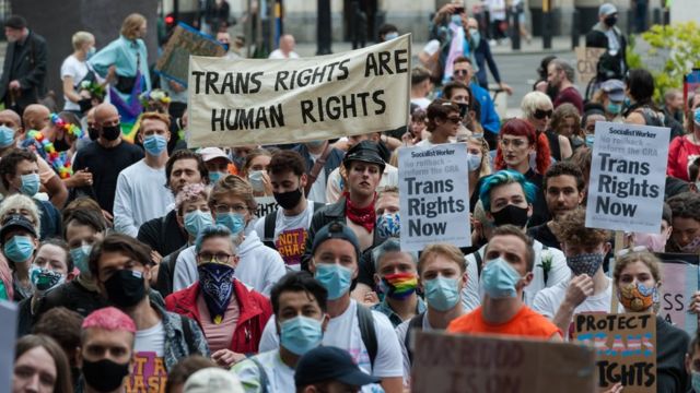 Transgender people and their supporters gather in Parliament Square to protest against potential changes to the Gender Recognition Act on 04 July, 2020 in London