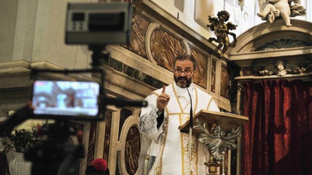 Priest streaming Mass in Italy