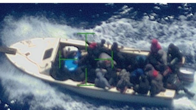 Aerial image of a boat with migrants in the Mona Passage