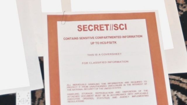 Dokumen yang menunjukkan kode rahasia.