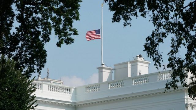White house flag shown at half-staff on Monday afternoon