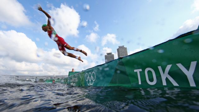Morocco's Mehdi Essadiq diving during the triathlon in Japan Monday - 26 July 2021