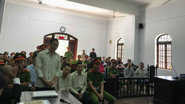 Ba bị cáo Ninh Viết Bình, Đặng Văn Hiến và Hà Văn Thường tại phiên tòa phúc thẩm hôm 12/7