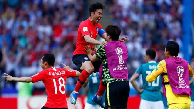 South Korea's forward Son Heung-min (C-L) celebrates scoring his goal during the Russia 2018 World Cup Group
