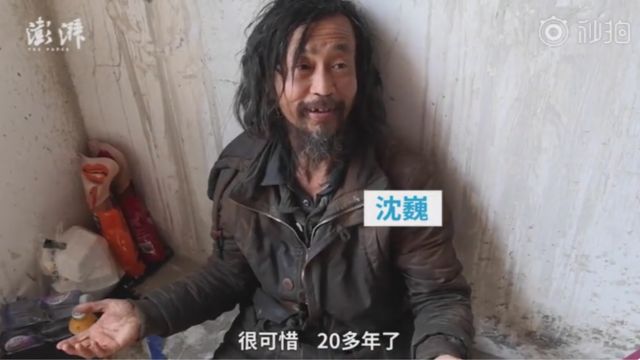 Shanghai, China. 30th Oct, 2006. A homeless man, with his