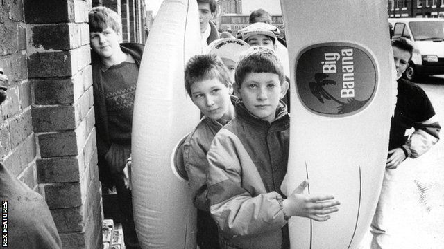 A young Manchester City fan with an inflatable banana in 1989