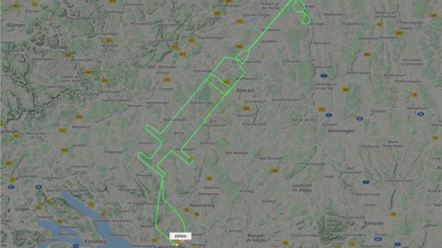 A flightradar24.com handout photo received on December 27, 2020 shows the flight track for a D-ENIG plane that traced a syringe on the maps in Germany to celebrate the arrival of a COVID-19 vaccine.