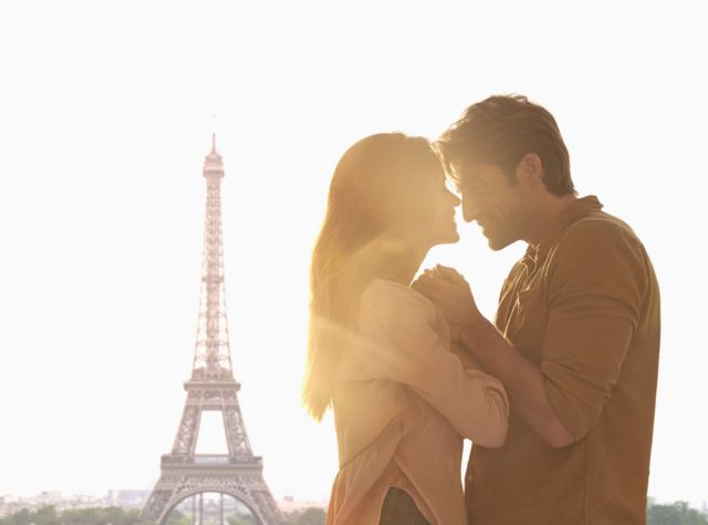 A man and a woman gaze into each others eyes