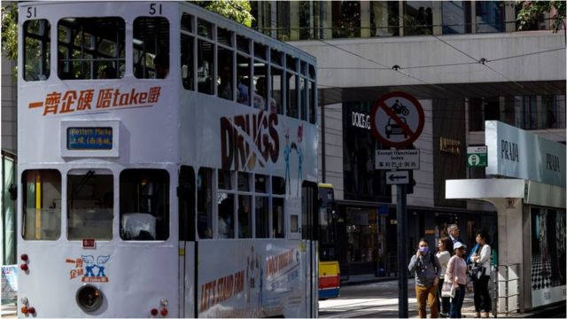 A tram travels through the Central district in Hong Kong, China, on Monday, Nov. 20, 2023.