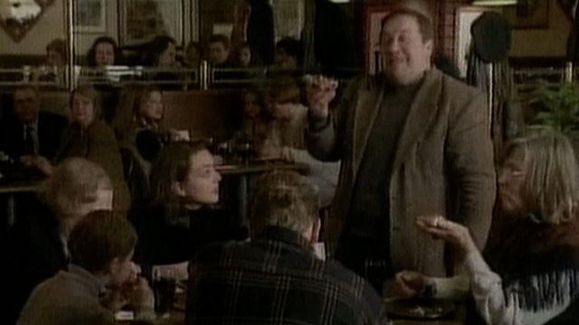 At the end, diners stand up to greet Gorbachev in a Pizza Hut ad