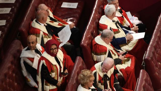 Peers find their places in the House of Lords before the State Opening Of Parliament at Houses of Parliament on June 21, 2017