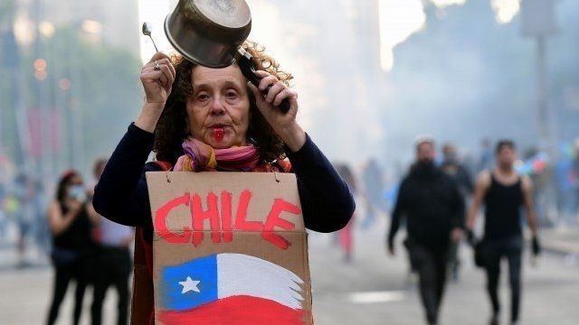 Anti-AFP protester in Chile.