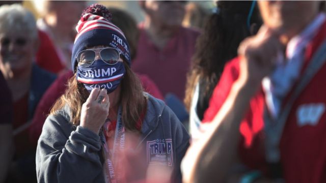 Trump supporters await the start of a march in Wisconsin on September 17, 2020