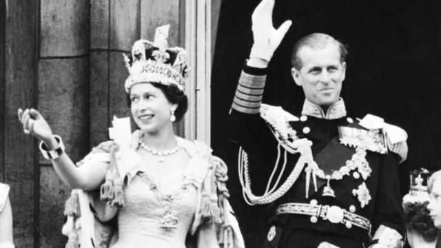 Queen Elizabeth II and Prince Philip dey wave to the crowd after her coronation - 1953