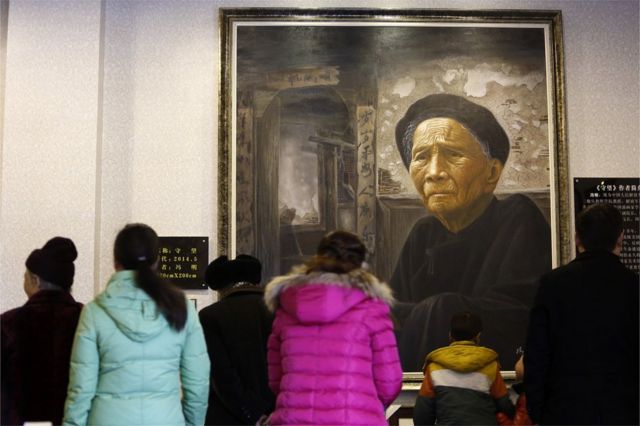This picture taken on 2 February 2015 shows people visiting the Modern Filial Piety Culture Museum in Qionglai, southwest China's Sichuan province