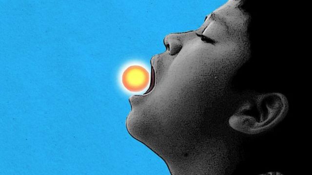 Illustration of a child eating a vitamin that looks like the Sun