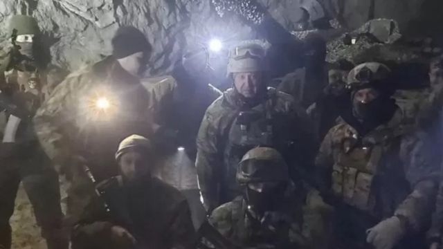 The commander of Wagner's forces with his soldiers in Solidar after its capture