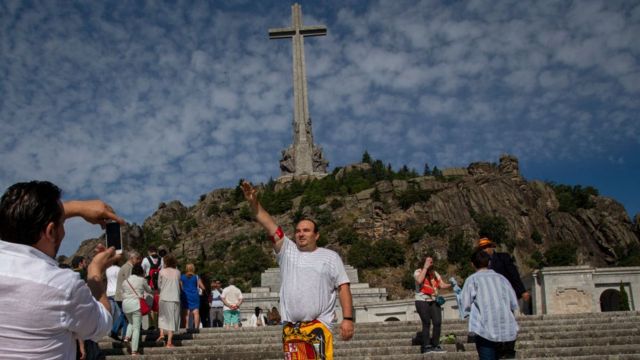 Franco supporter makes a salute at the entrance of the Valley of the Fallen