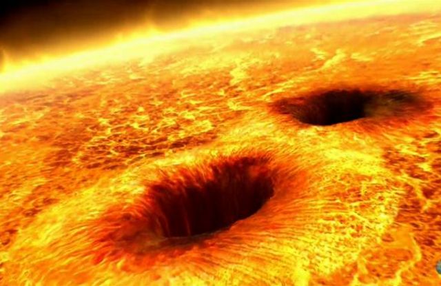 (ภาพจากฝีมือศิลปิน) จุดมืดบนดวงอาทิตย์เกิดจากสนามแม่เหล็กความเข้มสูงที่กักความร้อนเอาไว้ไม่ให้ออกสู่พื้นผิว