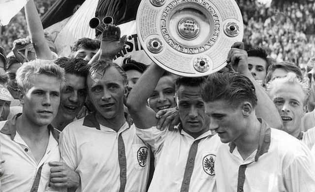 Eintracht Frankfurt players celebrate winning the 1959 German championship title