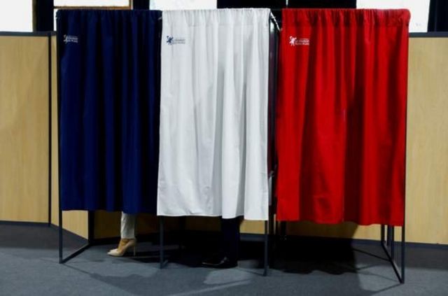 The curtain closes the polling place.