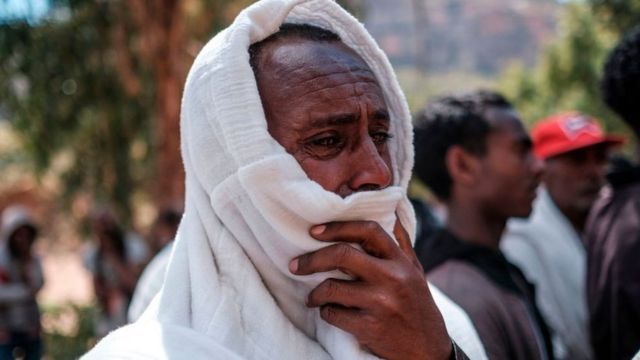 A man mourns in the village of Dengolat, North of Mekele, the capital of Tigray