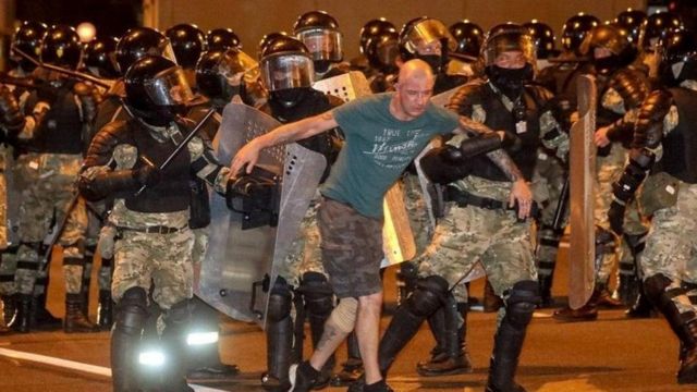 Riot police detain a protester in Minsk, Belarus. Photo: 9 August 2020