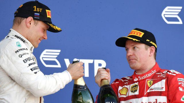 Raikkonen and Bottas celebrate on the podium