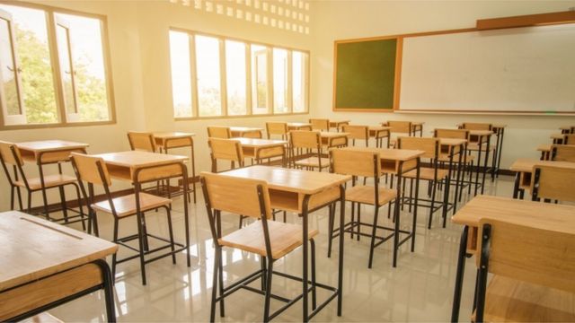 Lecture room or empty classroom with desks and chairs in thailand