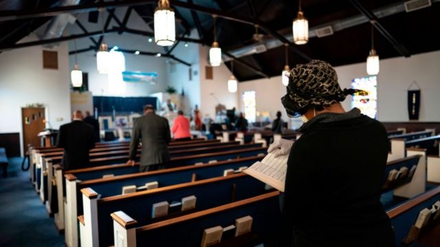 Congregants attend Sunday morning Easter services at The Friendship Baptist Church on April 12, 2020 in Baltimore.