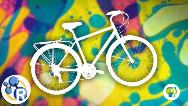 Bicicleta sobre un fondo de colores