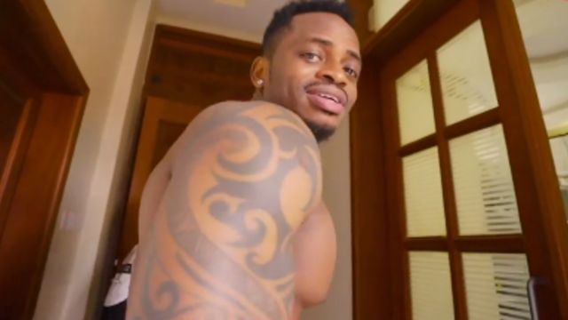 Diamond Platnumz being surprised at home by his record producers