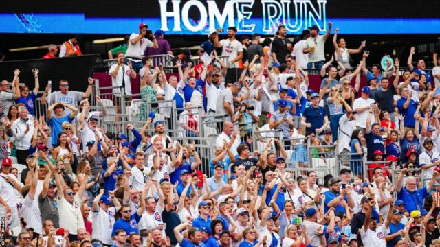 London Series: Chicago Cubs and St. Louis Cardinals walk out onto field and  national anthems 