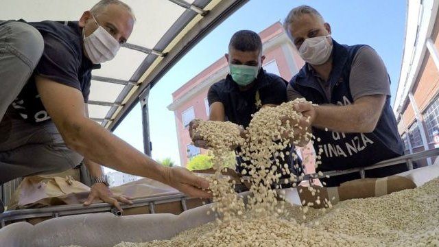 Italian police inspect barrels of counterfeit Captagon pills