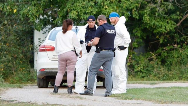 A police forensics team is investigating a crime scene after multiple people were stabbed to death in Weldon, Saskatchewan, Canada.