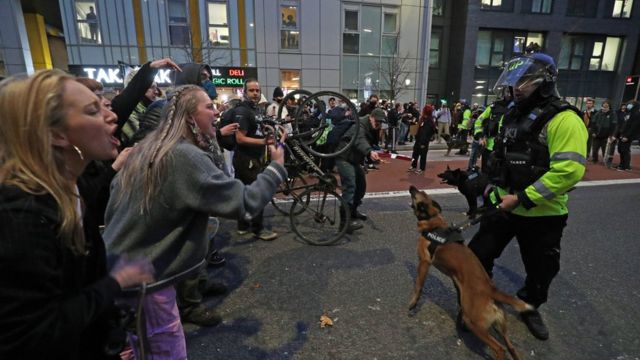 Protesters and police face off