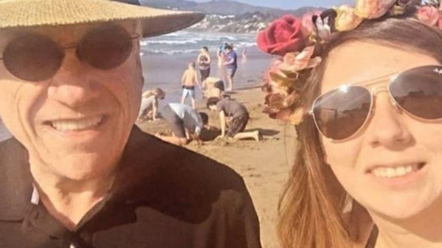 Chilean president and a woman without a snout on the beach