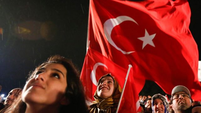 Supporters of Turkish President Tayyip Erdogan celebrate in Istanbul, 16 April