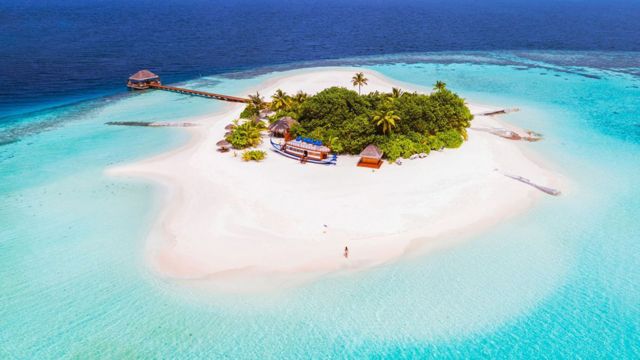 An aerial view of one of the 1200 islands making up the Maldives