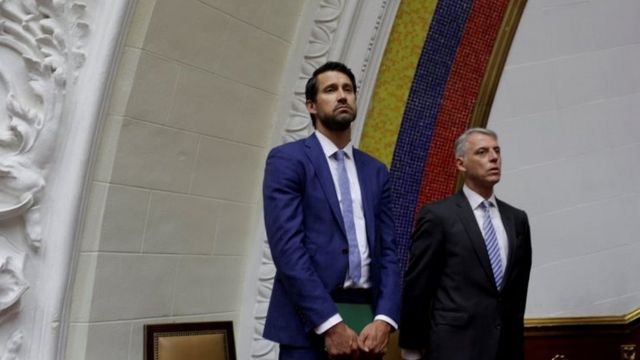 Craig Kowalik (L), political advisor to the embassy of Canada and Eduardo Porretti Charge d"Affaires of the embassy of Argentina attend a session of Venezuela's opposition-controlled National Assembly in Caracas, Venezuela, August 2, 2017.