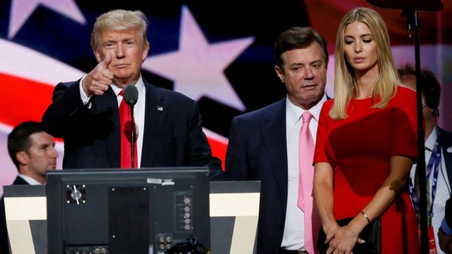 Donald Trump gives a thumbs up next to his campaign manager Paul Manafort and Ivanka Trump