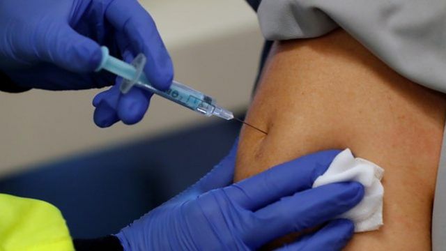 A person receiving the vaccine