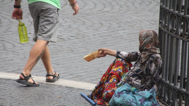 попрошайка в Италии