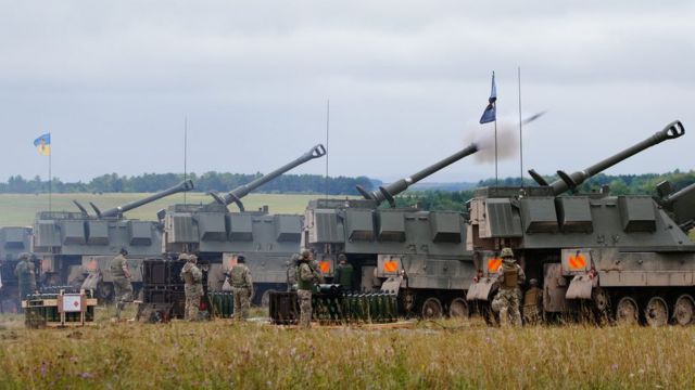 Newly trained Ukrainian artillery specialists firing British donated AS90 155mm self-propelled artillery guns under the supervision of British Army instructors as they come to the end of their training in south west England
