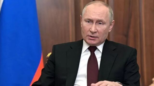 путін