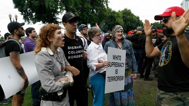 Counter-demonstrators (L) confront alt-right groups during a rally at Tom McCall Waterfront Park on August 17, 2019 in Portland, Oregon