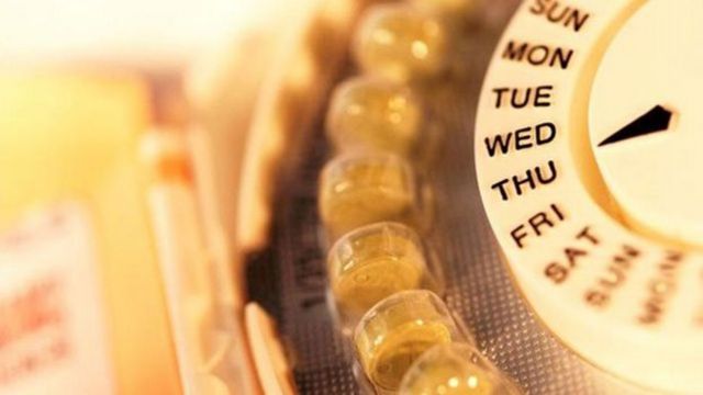 Píldoras anticonceptivas en envase redondo