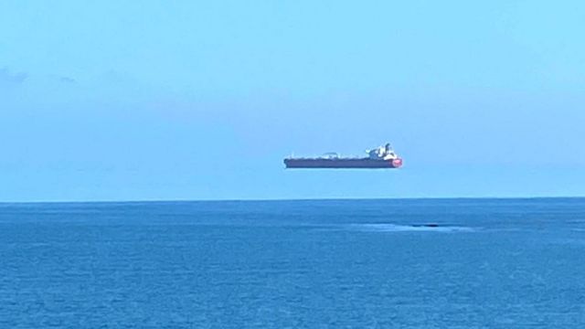 Hovering ship pictured off the coast of Cornwall