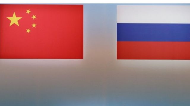 Chinese and Russian flags