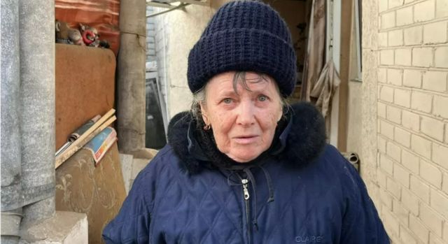 Tamara, 82, struggles to bury the body of her son, who was killed by Russian bombing in Kherson
